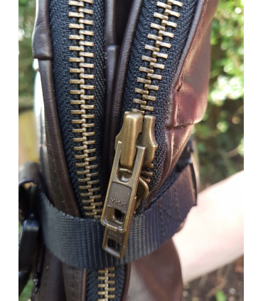 Zipped closure for top of bag folds over